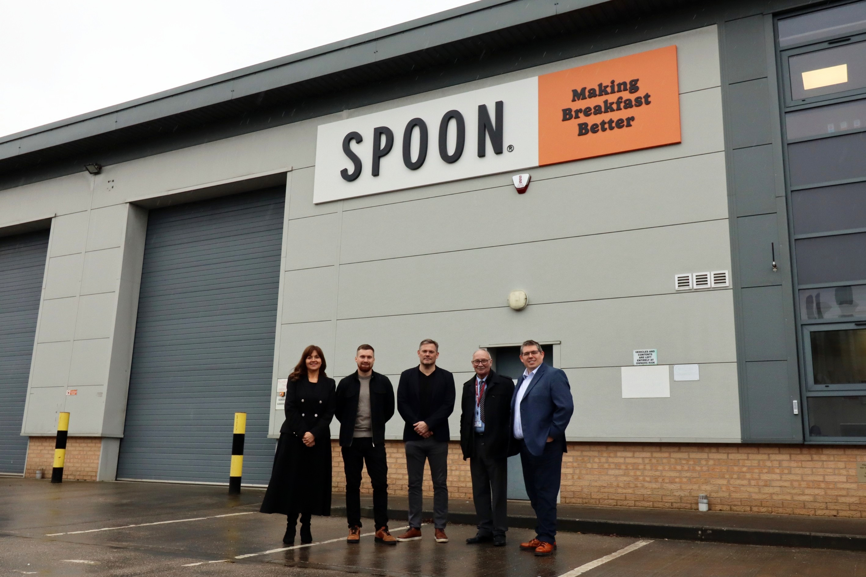 One woman and four men stood outside of Spoon Cereals building in Barnsley